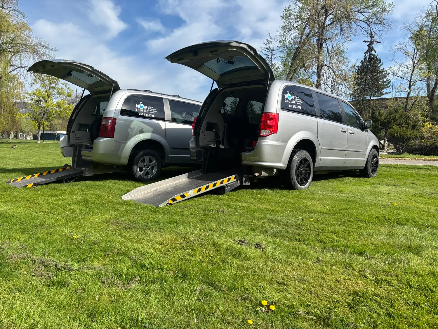 A NOW Shuttle accessible van with its rear-entry wheelchair ramp deployed