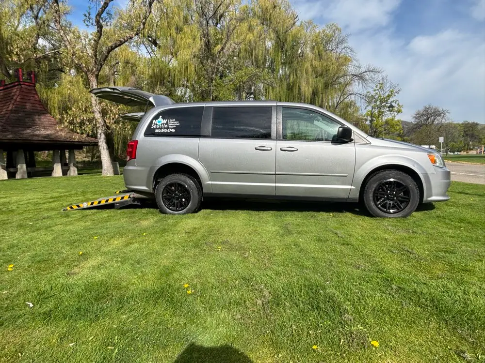 A NOW Shuttle accessible van with its ramp deployed