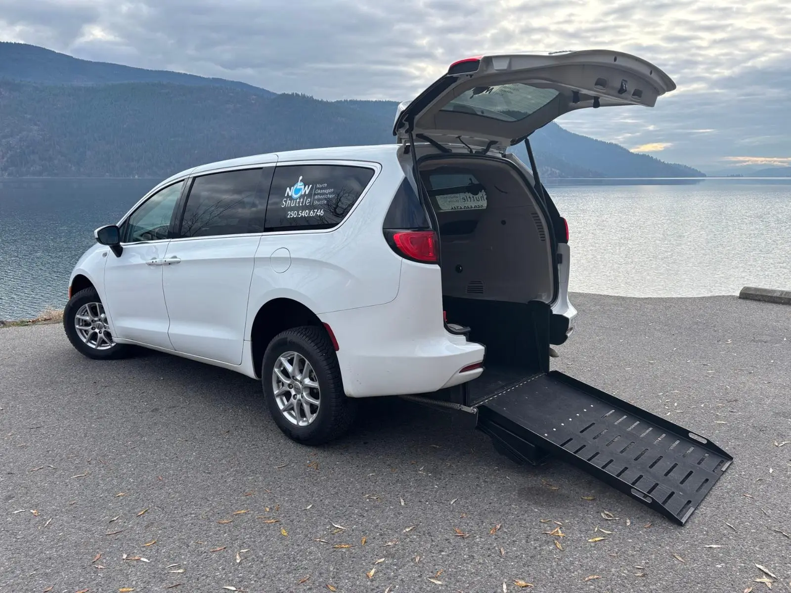 NOW Shuttle wheelchair accessible van with the rear ramp lowered